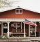 Serres ranch building with the american flag